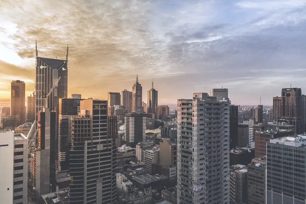 Towers of the city skyline in warm evening light